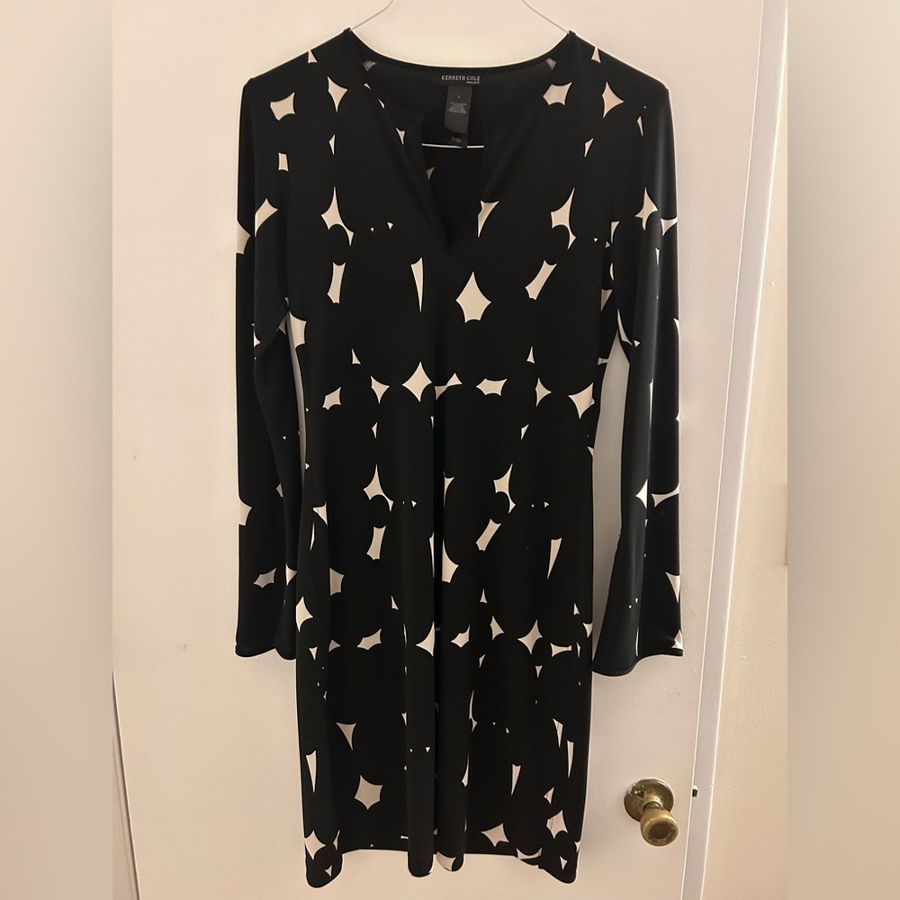 Black and White Kenneth Cole Dress with long sleeves. Size Medium